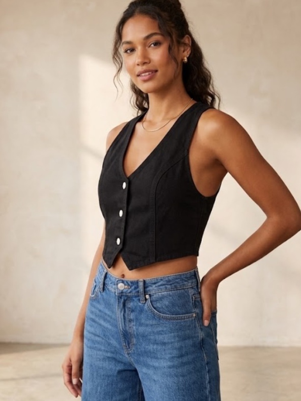 Sleeveless Black Button-Front Crop Vest